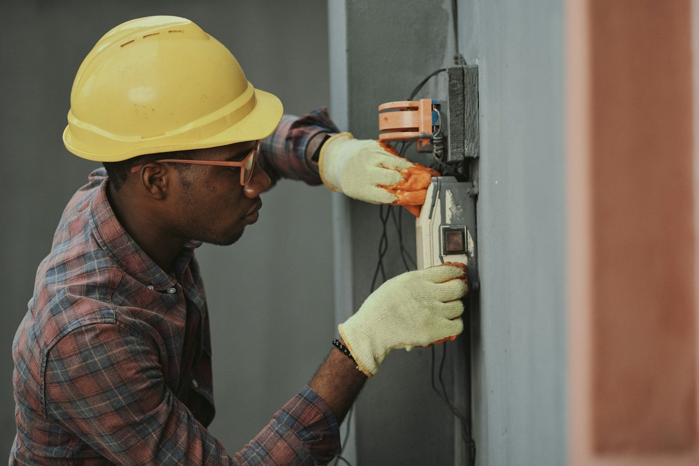 Air conditioning technician servicing indoor split AC unit